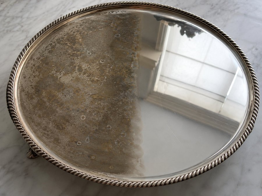 Silver tray, half tarnished and half mirror-bright after Best Solution