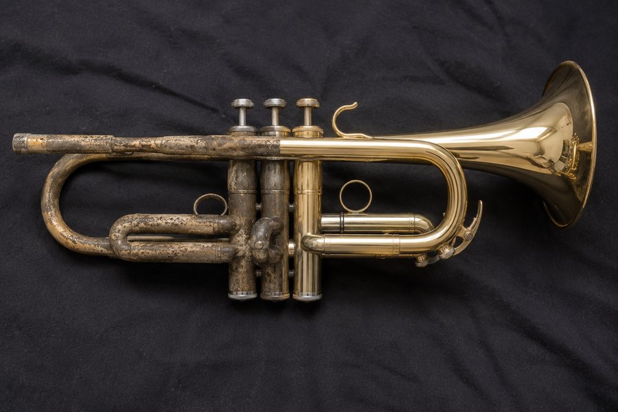 Brass trumpet, half tarnished and half gleaming