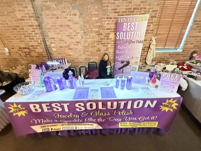 Best Solution booth on a fall market day