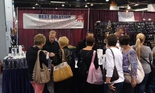 Customers gathered at the Best Solution booth